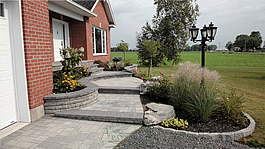 Archambault Paysage, conception d'aménagement paysager et jardin d'eau, pose et nettoyage de pavé-uni, gazon naturel et synthétique.