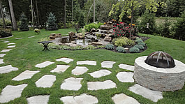 Archambault Paysage, conception d'aménagement paysager et jardin d'eau, pose et nettoyage de pavé-uni, gazon naturel et synthétique.